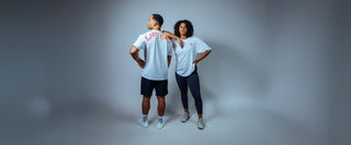 Man and woman wear the Lifters Oversize Gym Shirt Call Off-White